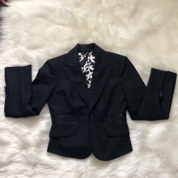 bebe Jackets & Blazers - Bebe Black Blazer with slitted sleeves